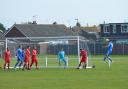 Wells Town in action against Caister Town
