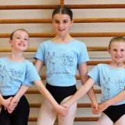 Young dancers, from left, Hannah Langley, Crystal Barnes, Anya Spencer