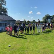 Peter Free, Norfolk Cricket Board womens and girls development officer, addresses the gathering of players, mums and dads before the start of play.