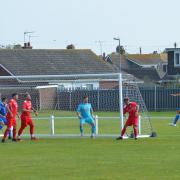 Wells Town in action against Caister Town
