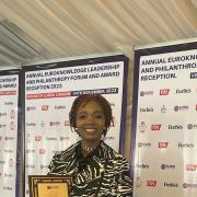 Anna Mudeka with her award