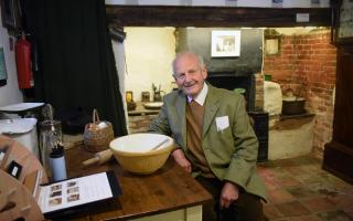 Dr Peter Wade-Martins exhibiting life in the Victorian era in Dereham Museum's reopening
