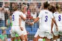 Lauren Hemp is congratulated by her England team-mates after scoring against Norway in the group stages of the Euros