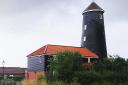 Yaxham Mill comprises the original mill tower, without its sails, and an adjoining two-storey bed and breakfast