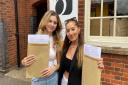 Shannon Fox (left) and Sophia Djiakouris were delighted after picking up their A-level results at Dereham Sixth Form College