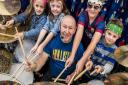 Pupils at St Mary's Primary School in Beetley, get a drum masterclass by former Status Quo drummer Jeff Rich - Pupils with Jeff Rich.. Picture: Matthew Usher.