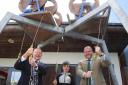 George Freeman (right), MP for Mid Norfolk, tries his hand at bellringing after launching Dereham Day