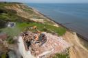The rubble from an 18th century farmhouse demolished on the cliffs at Trimingham on the north Norfolk coast has been cleared