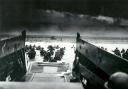 Allied troops wade ashore to a Normandy beach on D-Day June 6 1944.