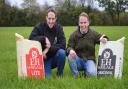 Peter Scott (left) and his brother Robert with horse feed made by EH Haylage at Beeston, near Dereham