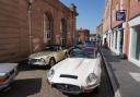 The Fakenham Auto Club members display their cars in the town's Market Place.