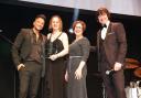 Naomi Daglish (second in from left) on stage with Peter Andre (far left), a NAPA representative, and host Steve Walls (far right) after being named the care home activity organiser of the year at the National Finals of the Great British Care Awards