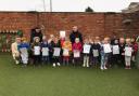 Staff and children at Little Owls Day Nursery, in Toftwood, celebrate its outstanding grade following its latest Ofsted inspection