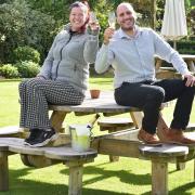 Yeray Sanchez, front of house manager and Office Manager, Cassandra Bishop-Harding at the Brisley Bell which was named best pub garden in 2021.