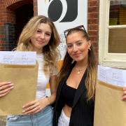 Shannon Fox (left) and Sophia Djiakouris were delighted after picking up their A-level results at Dereham Sixth Form College