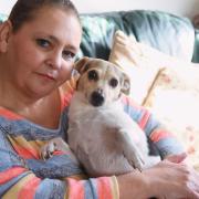 Contaminated blood victim, Michelle Tolley of Sparham, who is playing a large part in the public inquiry into the scandal, pictured with her dog, Poppy. Picture: DENISE BRADLEY