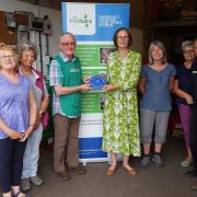 The Mid Norfolk Foodbank, based in Dereham, has been handed a blue plaque by Sara Foster, Deputy Lieutenant for Norfolk
