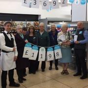 Dereham's Co-operative supermarket presents a cheque to Caring Friends for Cancer charity.  Picture: Margaret Barrett