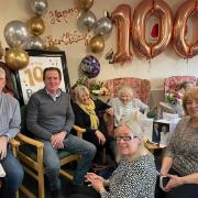 Molly Raine, who is cared for at York House in Dereham,  celebrating her 100th birthday with friends and family