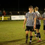 Dereham Town left their league form behind as they progressed to the semi-final of the Ashton's Legal Norfolk Senior Cup