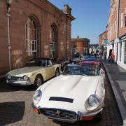 The Fakenham Auto Club members display their cars in the town's Market Place.