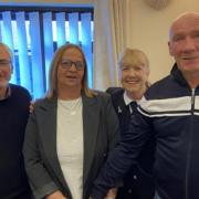 Tracey and George Rae with Love Dereham chairman Keith Mersh (left) and Dereham Baptist Church volunteer Lyn Milns