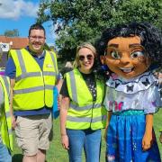 Volunteering at the outdoor cinema event, from left, were Justin Dack, Stuart Green, Gemma Drew, Mirabel Madrigal from Encanto and Kendra Cogman