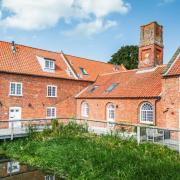 The house, which is part of a former steam engine house in Burnham Market, is on sale for £575,000