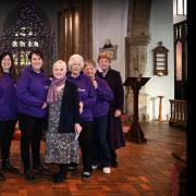 Volunteers withe Dereham Cancer Care gather for a special service to mark Turning Dereham Purple Day