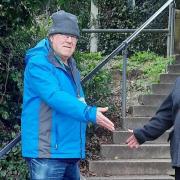 Councillors Harry Clarke and Ray O'Callaghan at the steps near South Green Gardens in Dereham.