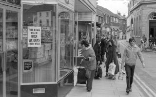 Woolworths store in Dereham advertising it is to be open 6 days a week, 10 March 1982. Photo: Archant Library