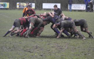 Wymondham and Dereham forwards, right, struggle for traction on Saturday. Picture: KIRSTY DREW
