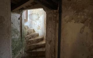 The stairs from the crypt to the church at Brisley\'s St Bartholomew\'s Church