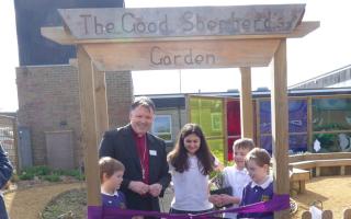 The Bishop of Norwich opened the garden with the help from monitors William, Jacob, Amani and Heath